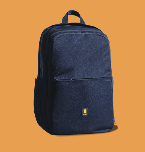 Navy blue backpack on an orange background with a front zip pocket and top handle.