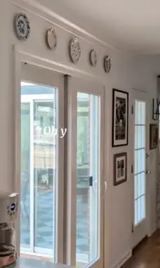 China Plates on top of a white sliding door